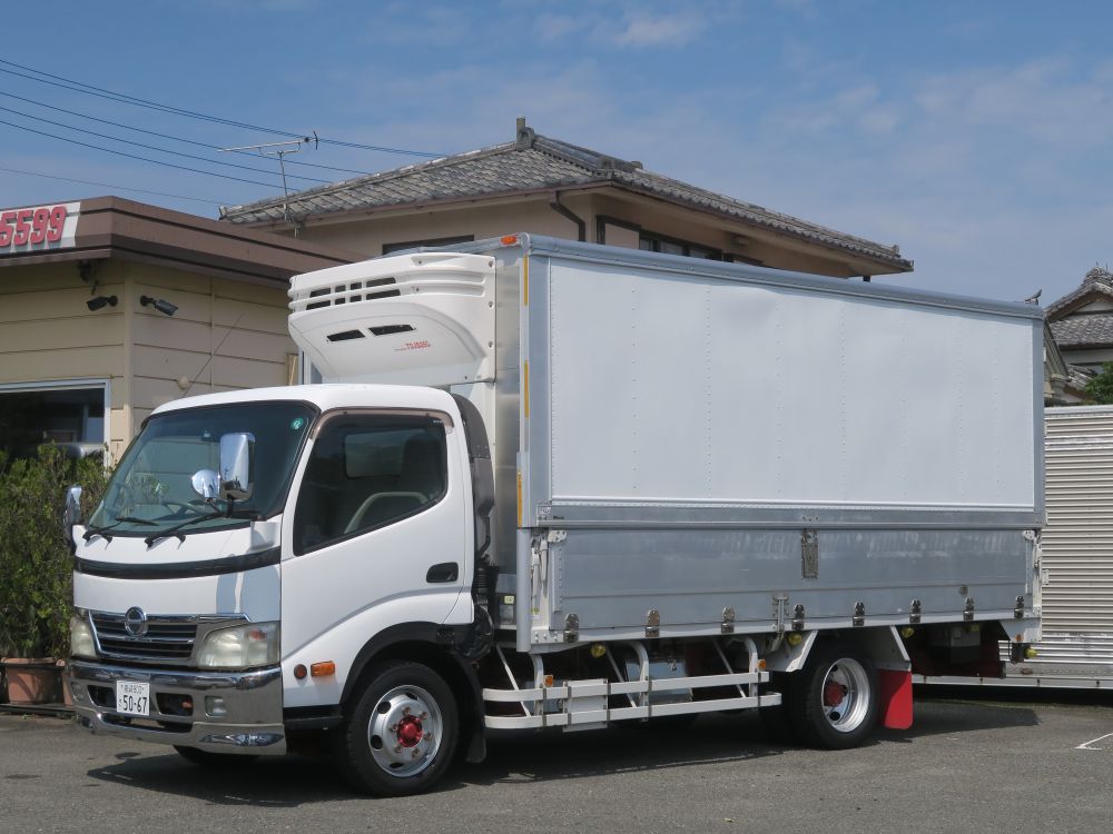 7025